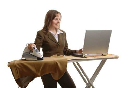 Bussiness woman with laptop and iron