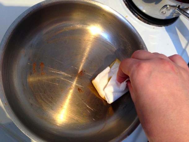 Greasing the pan with melted butter