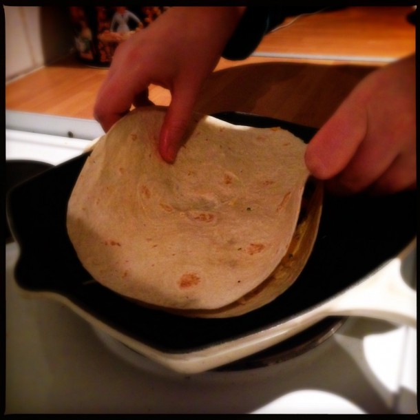 15. Place quesadilla into pan