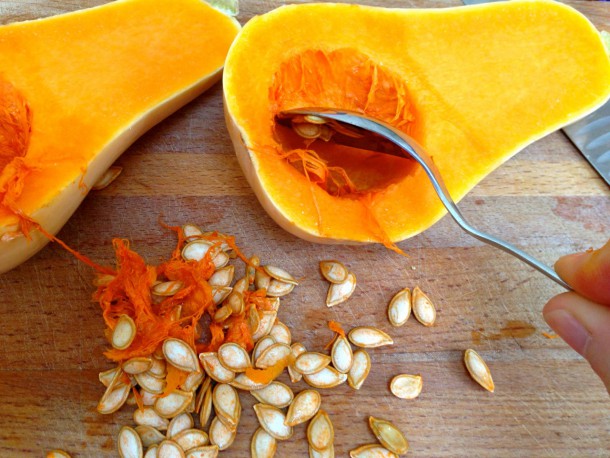 3. Scoop seeds out of butternut squash