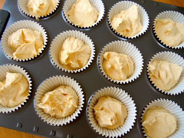 11. Spoon cake batter in cupcake pan