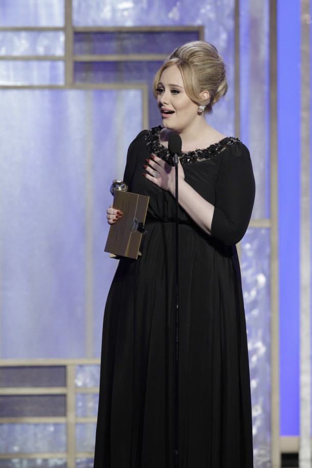 BEVERLY HILLS, CA - JANUARY 13: In this handout photo provided by NBCUniversal,  Singer Adele accepts the Best Original Song award for Motion Picture, "Skyfall" on stage during the 70th Annual Golden Globe Awards at the Beverly Hilton Hotel International Ballroom on January 13, 2013 in Beverly Hills, California. (Photo by Paul Drinkwater/NBCUniversal via Getty Images)