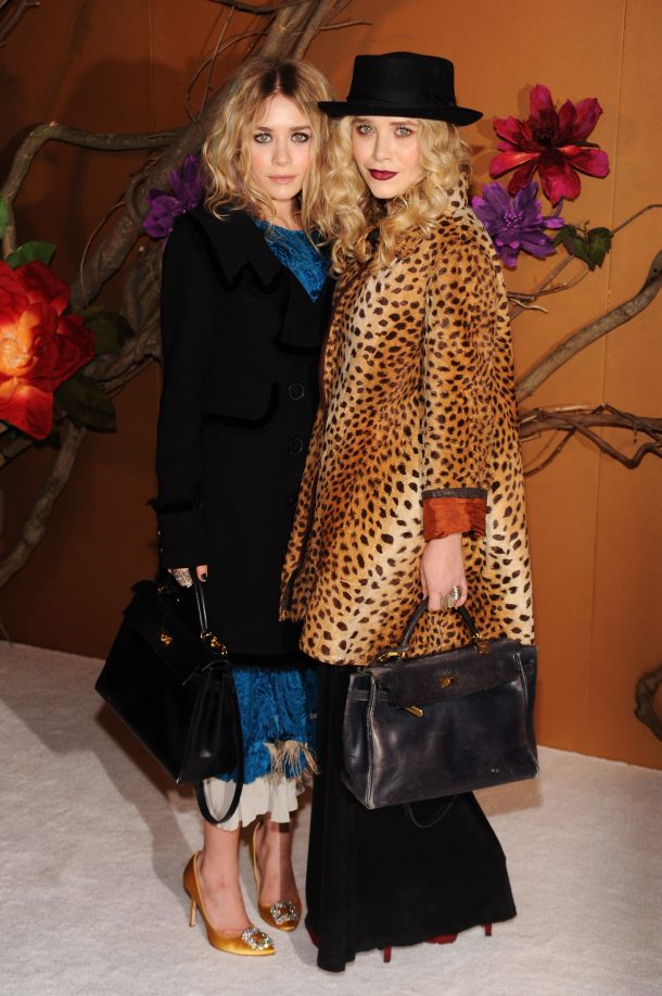 NEW YORK - NOVEMBER 17: Ashley Olsen (L) and Mary-Kate Olsen attend 'The Museum of Modern Art Film Benefit: A Tribute To Tim Burton' at The Museum of Modern Art on November 17, 2009 in New York City. (Photo by Bryan Bedder/Getty Images)