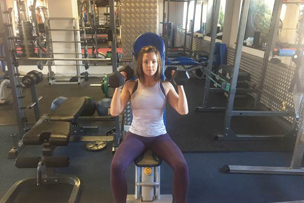 Seated-shoulder-press-with-rotation.-gif