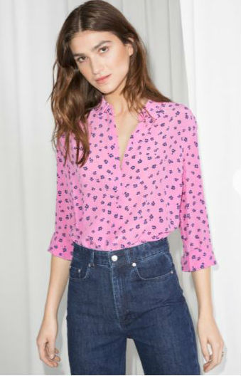 model wearing & other stories pink silk shirt with collar and jeans