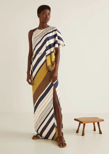 model wearing floor length asymmetrical dress from mango